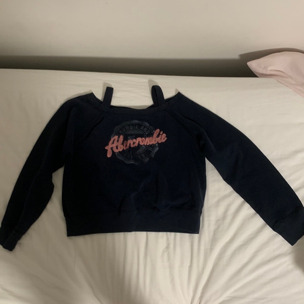 This is a loose dark blue shirt from Abercrombie Kids.